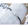 Kép 4/7 - Acél violinkulcs medálos MiniM nanocord karkötő